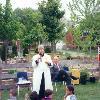 International School Peace Garden founders Julia Morton-Marr and Eric Foster take part in the dedication of the St Agnes School Peace Garden in 1995.