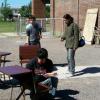 Students at Escuela Superior de Comercio  #43 preparing benches to be included in their garden.
