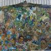 Auckland City Council funded the mural overlooking the Peace Garden.  The mural was created by staff and refugee students at Selwyn College.